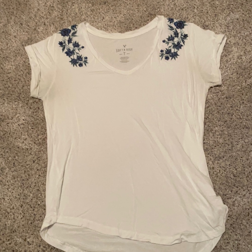 Soft cotton top with embroidery on the shoulders.